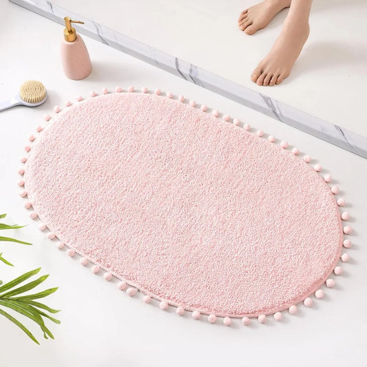 Bath Mat Blush Pink Rug with Pom Oval Bathroom Rugs for Bedroom Non Slip Cute Boho Absorbent Mats Soft Plush Washable Rug (20x30)